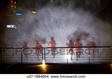 Water display at Marina Bay, Singapore. View Large Photo Image Picture - Water display at Marina Bay, Singapore.. Fotosearch