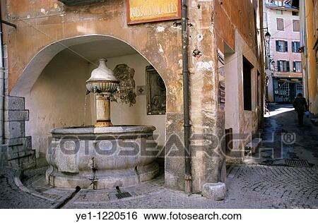Water fountain dated ca. 1525 in the historical city of Briancon, French Alps, France. View Large Photo Image Stock Photograph - Water fountain dated ca. 1525 in the historical city of Briancon, French Alps, France.. Fotosearch