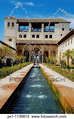 Water fountains in the courtyard at Alhambra, a 14th-century palace in Granada, Andalusia, Spain. View Large Photo Image Stock Photography - Water fountains in the courtyard at Alhambra, a 14th-century palace in Granada, Andalusia, Spain.. Fotosearch