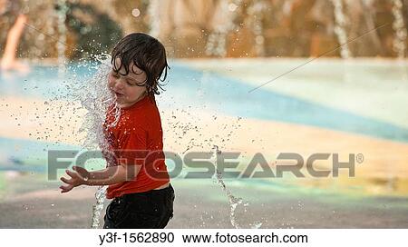 Water fun - playing in the water feature park on the banks of the Brisbane River in Brisbane, Australia View Large Photo Image Stock Image - Water fun - playing in the water feature park on the banks of the Brisbane River in Brisbane, Australia. Fotosearch