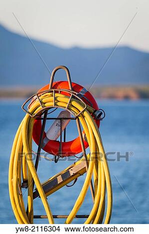 Picture - Water hose and life preserver, Reykjavik, Iceland.. Fotosearch