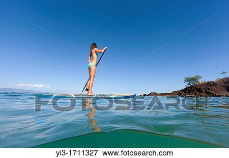 Water level view of stand up paddling at Ka? anapali Beach, Maui, Hawaii View Large Photo Image Stock Photo - Water level view of stand up paddling at Ka? anapali Beach, Maui, Hawaii. Fotosearch