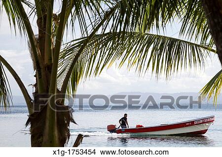Water taxi pulling into Starfish beach on Isla Colon, Bocas del Toro, Panama View Large Photo Image Picture - Water taxi pulling into Starfish beach on Isla Colon, Bocas del Toro, Panama. Fotosearch