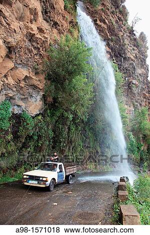 waterfall at the old coastal road, also called the car washing street, Madeira, Portugal, Europe View Large Photo Image Stock Photo - waterfall at the old coastal road, also called the car washing street, Madeira, Portugal, Europe. Fotosearch