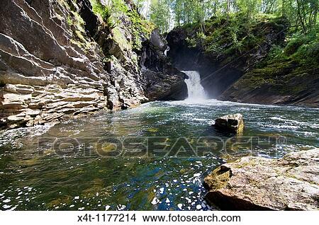 Picture - Waterfall in Hornindal, Norway, summer sunshine. Fotosearch