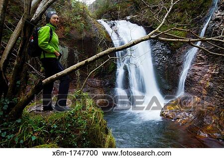 Stock Image - Waterfall Sobrescobio Alba river route Redes National Park, Asturias, Spain. Fotosearch