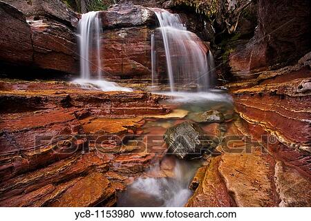 Stock Image - Waterfalls near Saint Mary Lake, Glacier National Park. Fotosearch