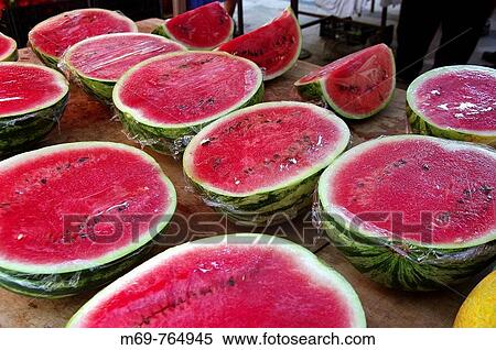 Watermelons for sale at market, Santanyi. Majorca, Balearic Islands, Spain View Large Photo Image Stock Photography - Watermelons for sale at market, Santanyi. Majorca, Balearic Islands, Spain. Fotosearch