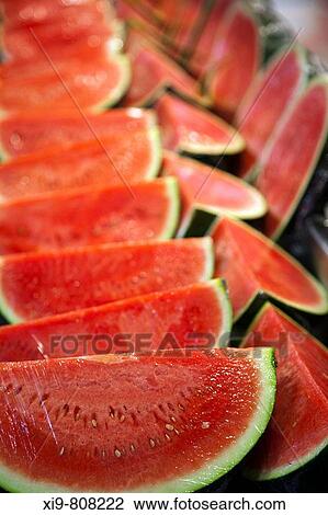 Stock Image - Watermelons in La Boqueria market, Barcelona. Catalonia, Spain. Fotosearch
