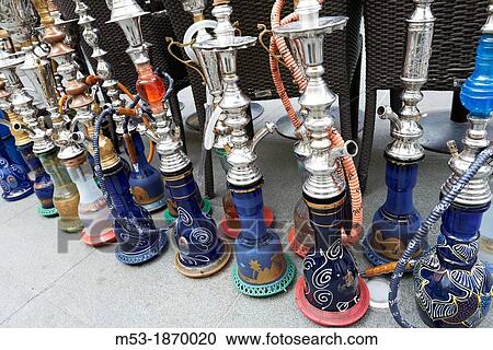 Waterpipes outside a middle eastern restaurant View Large Photo Image Stock Image - Waterpipes outside a middle eastern restaurant. Fotosearch