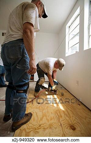Waveland, Mississippi - Volunteers from Methodist Churches in Kansas renovate a home damaged by Hurricane Katrina View Large Photo Image Stock Image - Waveland, Mississippi - Volunteers from Methodist Churches in Kansas renovate a home damaged by Hurricane Katrina. Fotosearch