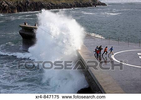 Waves breaking on mole, port of Lequeitio (Lekeitio), Vizcaya (Bizkaia), Basque Country, Spain View Large Photo Image Stock Photography - Waves breaking on mole, port of Lequeitio (Lekeitio), Vizcaya (Bizkaia), Basque Country, Spain. Fotosearch