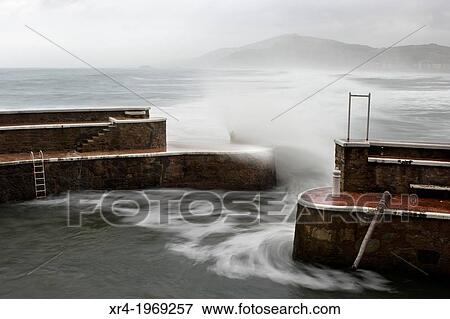 Waves in the port of Zarautz, Port of Zarautz, Zarautz, Gipuzkoa, Guipuzcoa, Basque Country, Spain. View Large Photo Image Stock Photo - Waves in the port of Zarautz, Port of Zarautz, Zarautz, Gipuzkoa, Guipuzcoa, Basque Country, Spain.. Fotosearch