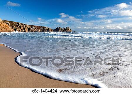Waves on the beach at Porthcurno Cornwall England UK 2011 View Large Photo Image Picture - Waves on the beach at Porthcurno Cornwall England UK 2011. Fotosearch