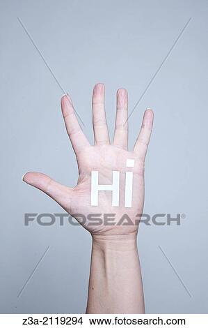 Waving hand saying HI. View Large Photo Image Picture - Waving hand saying HI.. Fotosearch