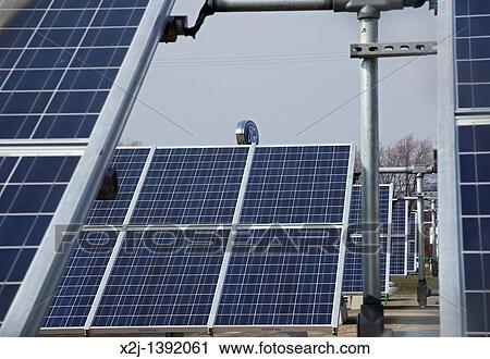 Wayne, Michigan - A 500-kilowatt solar array helps power Ford Motor Co? s Michigan Assembly Plant View Large Photo Image Stock Image - Wayne, Michigan - A 500-kilowatt solar array helps power Ford Motor Co? s Michigan Assembly Plant. Fotosearch