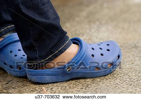 Wearing rubber shoes. View Large Photo Image Stock Image - Wearing rubber shoes.. Fotosearch