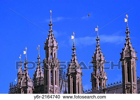 Weathervanes on the Houses of Parliament on a sunny Summer day in Westminster, London, England. View Large Photo Image Stock Image - Weathervanes on the Houses of Parliament on a sunny Summer day in Westminster, London, England.. Fotosearch