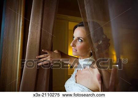 Wedding bride looking out the window. View Large Photo Image Stock Photography - Wedding bride looking out the window.. Fotosearch