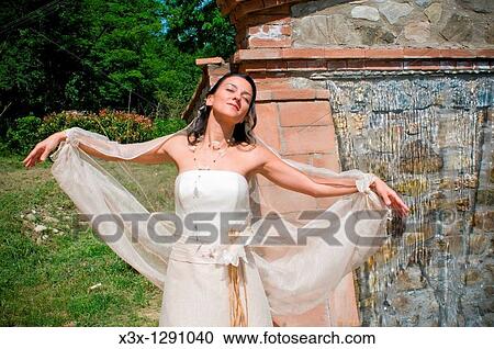 Wedding bride portrait in plastic pose View Large Photo Image Stock Image - Wedding bride portrait in plastic pose. Fotosearch