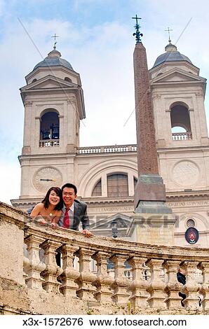 Stock Photograph - Wedding couple at Trinit? dei Monti in Rome Italy. Fotosearch