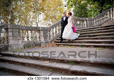 Wedding couple descending stairs Rome Italy View Large Photo Image Picture - Wedding couple descending stairs Rome Italy. Fotosearch