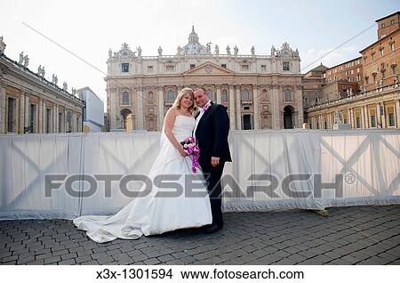 Wedding couple in front of Saint Peter's Basilica in Rome Italy View Large Photo Image Picture - Wedding couple in front of Saint Peter's Basilica in Rome Italy. Fotosearch