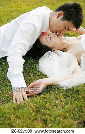 wedding couple kissing outdoor View Large Photo Image Stock Photo - wedding couple kissing outdoor. Fotosearch