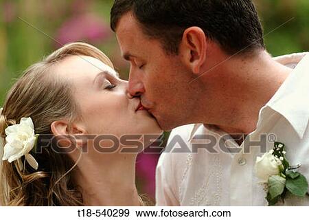 wedding couple kissing View Large Photo Image Stock Photo - wedding couple kissing. Fotosearch