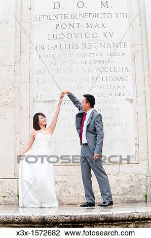 Stock Image - Wedding couple Trinit? dei Monti Rome Italy. Fotosearch