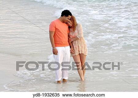 Wedding couple walking on the beach, Miami Beach, Florida, USA. View Large Photo Image Stock Photography - Wedding couple walking on the beach, Miami Beach, Florida, USA.. Fotosearch