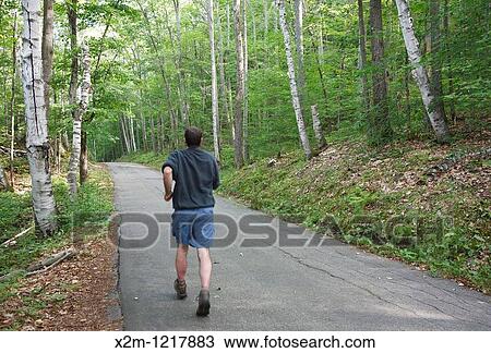 Weeks State Park - Man jogging at John Wingate Weeks Estate on the summit of Mt Prospect in Lancaster, New Hampshire USA The Mount Prospect Tower was built by John W Weeks in 1912 and is still in operation today View Large Photo Image Stock Image - Weeks State Park - Man jogging at John Wingate Weeks Estate on the summit of Mt Prospect in Lancaster, New Hampshire USA The Mount Prospect Tower was built by John W Weeks in 1912 and is still in operation today. Fotosearch
