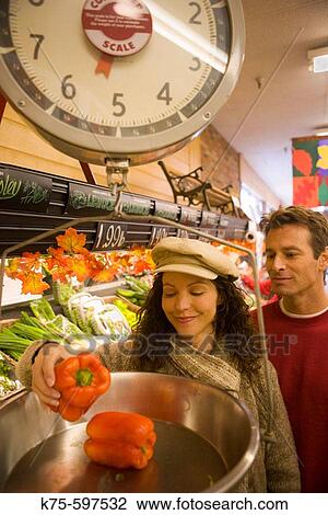 Weighing produce View Large Photo Image Stock Image - Weighing produce. Fotosearch