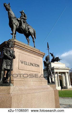 Wellington Monument and Wellington Arch, Hyde Park Corner, London, England View Large Photo Image Stock Image - Wellington Monument and Wellington Arch, Hyde Park Corner, London, England. Fotosearch