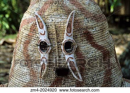 Stock Image - WEST NEW GUINEA (IRIAN JAYA), ASMAT REGION, SPIRIT MASK CLOSE-UP.. Fotosearch