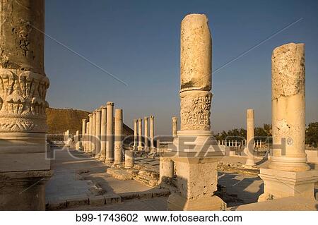 Stock Image - WESTERN BATHHOUSE COLONNADE RUINS PALLADIUS STREET BYZANTINE COLONNADE RUINS TEL BEIT SHEAN NATIONAL PARK ISRAEL. Fotosearch
