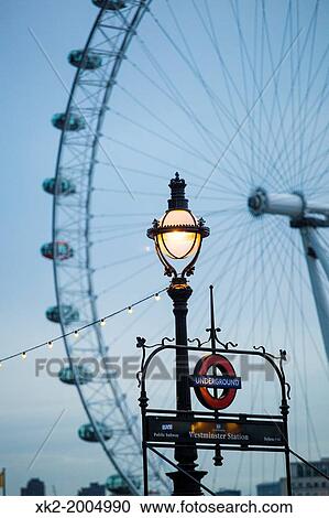 Westminster Station sign with London Eye, London, UK View Large Photo Image Stock Image - Westminster Station sign with London Eye, London, UK. Fotosearch