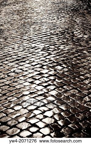 Wet cobbled road, Rome, Italy. View Large Photo Image Stock Photograph - Wet cobbled road, Rome, Italy.. Fotosearch