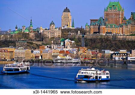 Wharf at the Port of Quebec, above which stands the Chateau Frontenac hotel Quebec City, Quebec, Canada View Large Photo Image Stock Photography - Wharf at the Port of Quebec, above which stands the Chateau Frontenac hotel Quebec City, Quebec, Canada. Fotosearch