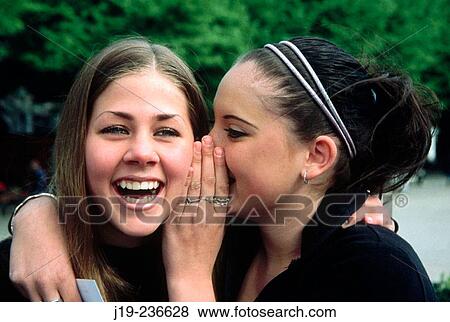 Stock Photo - Whispering. Fotosearch