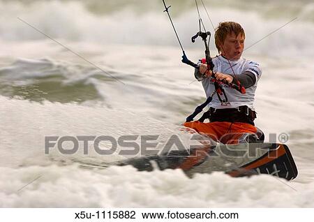 White Air Extreme sports festival October 2005 Isle of Wight Young kite surfers in the Pro competition Robin Snuggs 15 from Weymouth is the youngest Professional kitesurfer in Europe View Large Photo Image Stock Image - White Air Extreme sports festival October 2005 Isle of Wight Young kite surfers in the Pro competition Robin Snuggs 15 from Weymouth is the youngest Professional kitesurfer in Europe. Fotosearch
