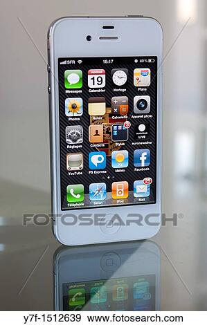White Apple phone iphone 4 on desk View Large Photo Image Stock Photo - White Apple phone iphone 4 on desk. Fotosearch
