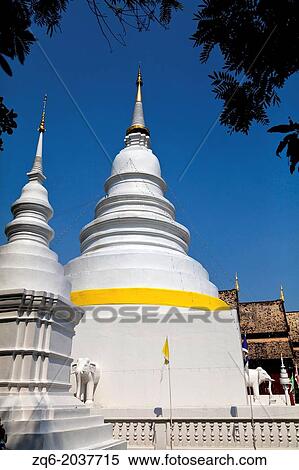 Stock Photography - White Chedi of the Temple Wat Phra Singh in Chiang Mai, Thailand.. Fotosearch