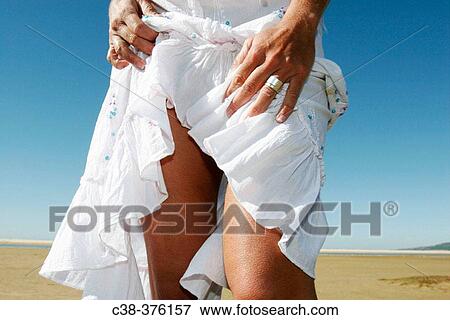 white dress and tan legs View Large Photo Image Stock Photo - white dress and tan legs. Fotosearch