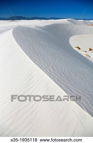 White sand dunes in White Sands National Monument. Alamogordo. New Mexico. USA. View Large Photo Image Stock Photo - White sand dunes in White Sands National Monument. Alamogordo. New Mexico. USA.. Fotosearch