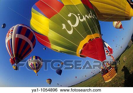 Wide view of hot air balloons take off. Mondial air balloon festival, largest one in Europe. Chambley, Lorraine, France. Europe View Large Photo Image Stock Photograph - Wide view of hot air balloons take off. Mondial air balloon festival, largest one in Europe. Chambley, Lorraine, France. Europe. Fotosearch