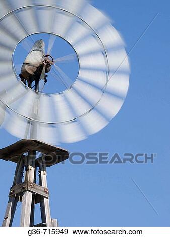 Wind mill turning near Paso Robles, California, USA View Large Photo Image Stock Photo - Wind mill turning near Paso Robles, California, USA. Fotosearch