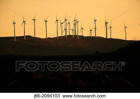 wind turbine at sunset in the Maestrazgo, near Morella. Castell? n. View Large Photo Image Stock Image - wind turbine at sunset in the Maestrazgo, near Morella. Castell? n.. Fotosearch
