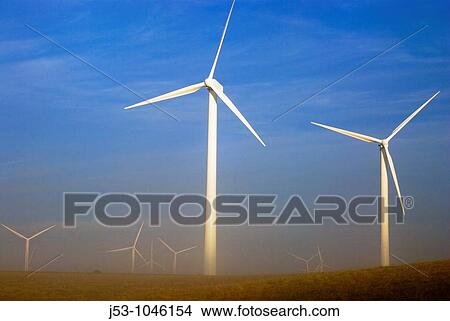 Wind turbines at dawn with ground fog, Judith Gap, Montana USA View Large Photo Image Picture - Wind turbines at dawn with ground fog, Judith Gap, Montana USA. Fotosearch