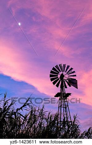 Stock Image - Wind wheel at dusk, Namibia. Fotosearch